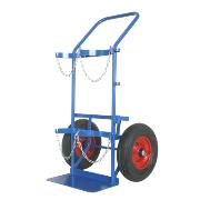 
A trolley for two technical gas cylinders in a vertical arrangement