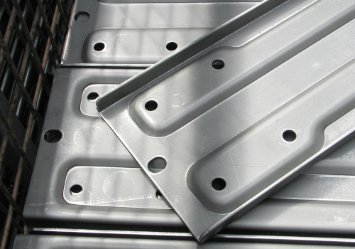 Stamping elements from sheet steel